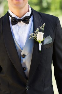 7811295-midsection-of-groom-wearing-boutonniere